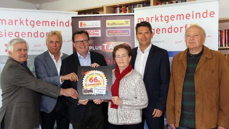 Personen bei der Präsentation