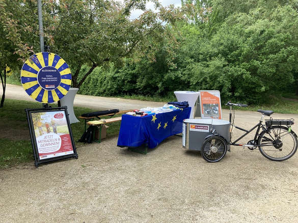 Infostand/Erlebnisraum mit Glücksrad, Lastenrad